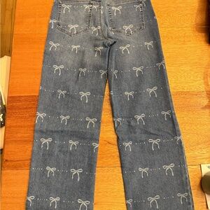 Size 28 “And Now This” Straight Leg Jean Bow Print High Rise